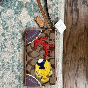 Coach vintage fish design wristlet. Brand new with tags.
